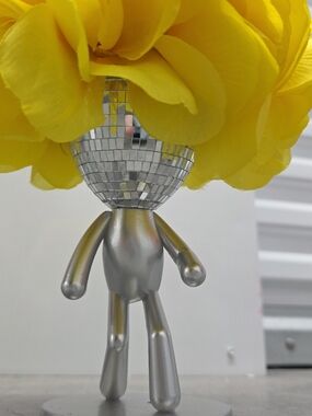 Silver Disco Head Figurine with Bright Yellow Flower Top - Handmade